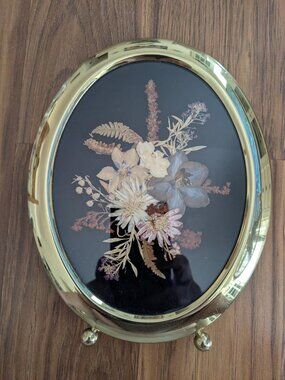 VTG Goldtone Oval Footed Frame Black Backing with Botanical dry Pressed Flowers